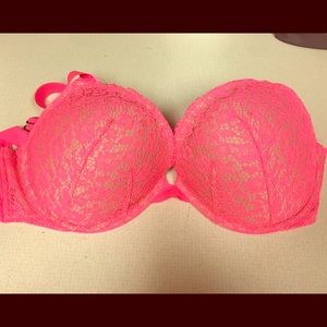 Nude bra with pink straps and pink overlay