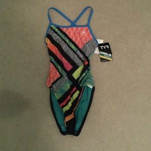 TYR onesie