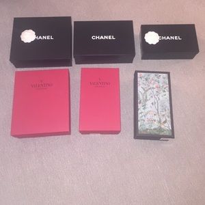 2 Valentino boxes, 1 Gucci box, and 3 Chanel boxes