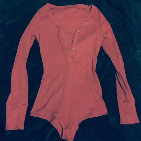 Red button up jump suit