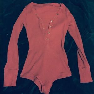 Red button up jump suit