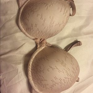Beige with a floral design bra