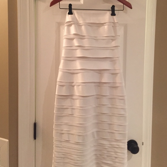 White, figure-flattering dress
