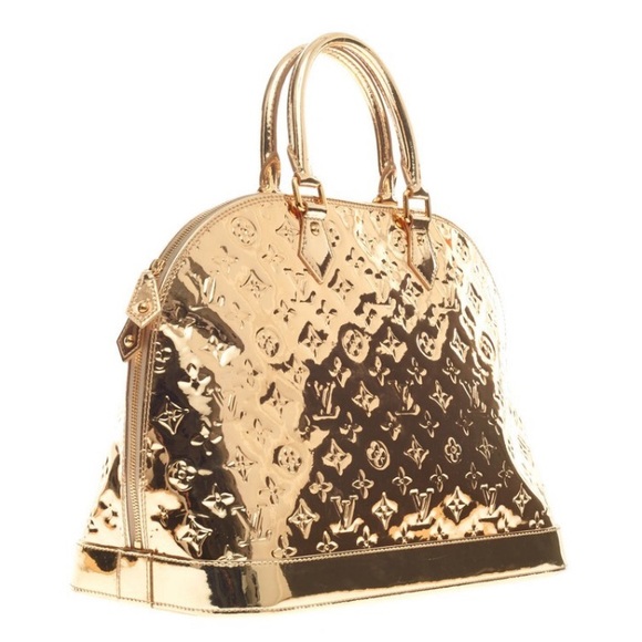 Louis Vuitton Limited Edition monogram Miroir Alma