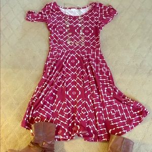 Nicole. Like New. Worn once. Magenta color.