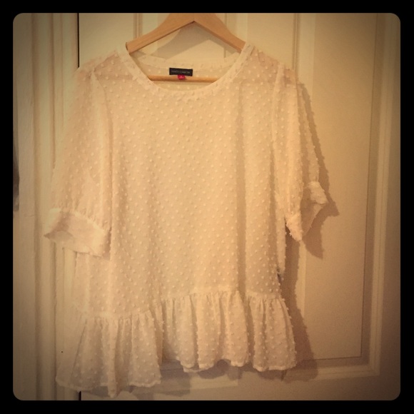 Sheer Vince Camuto top.