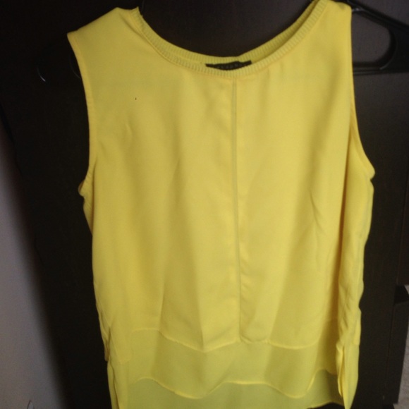 Yellow sleeveless top