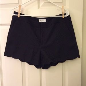 Black scalloped shorts