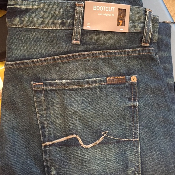 New with tags! Mens bootcut original fit 7 jeans.