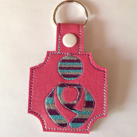 Baby wearing symbol key fob