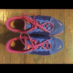 Nike purple and pink running shoes
