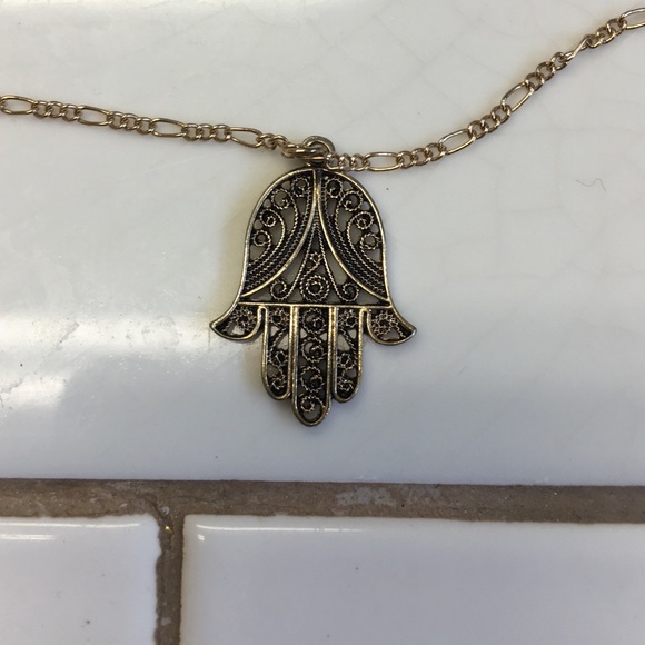 Hamsa necklace.