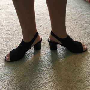 Bandolino black mules with 2 1/2 inch heels.