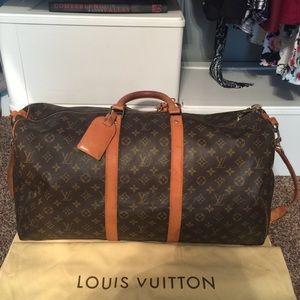 Louis Vuitton keepall 55 duffle with strap
