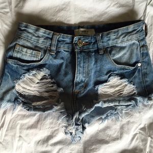 Regular waist denim shorts.