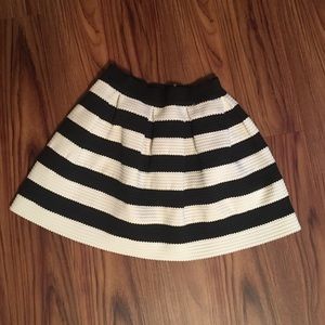 Contemporary black and white pleated skirt