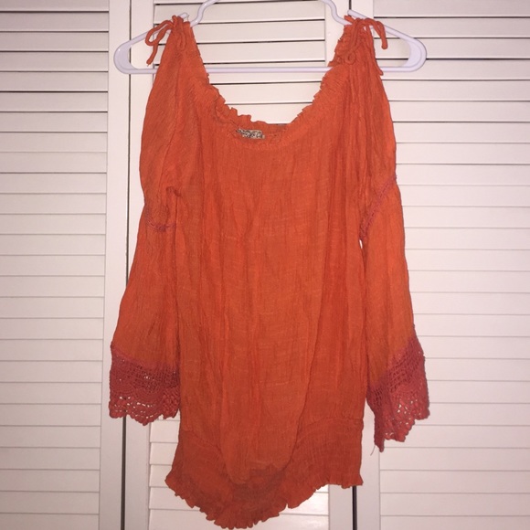 Brightly colored long sleeve top
