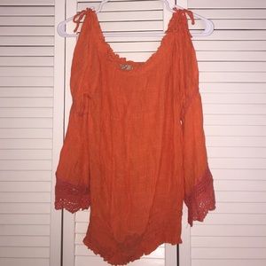 Brightly colored long sleeve top