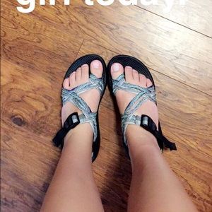 Purple and light blue Chacos size 7