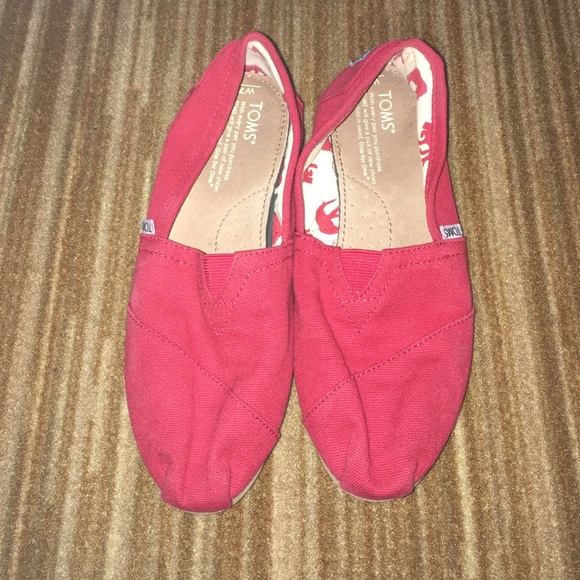 Red woman's toms size 7