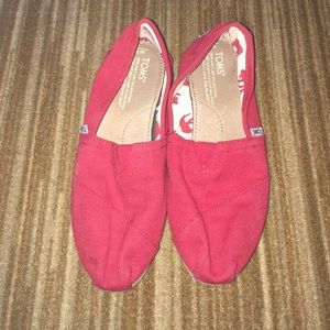Red woman's toms size 7