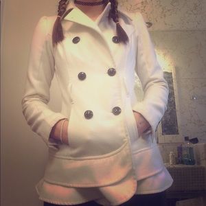 This is a heavy white button up jacket.