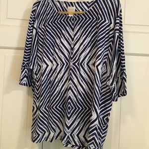 Chico size 3 shirt.