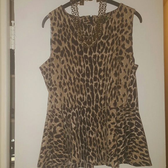 Animal print zip back peplum top