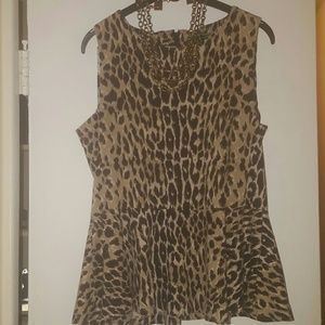 Animal print zip back peplum top