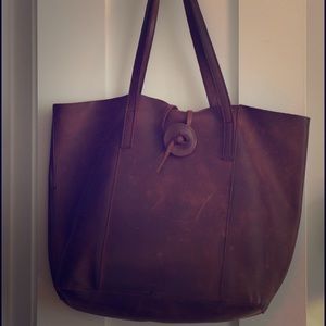 Large brown leather tote bag