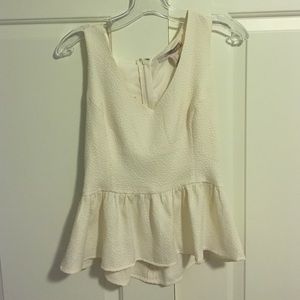 ADORABLE cream peplum top!