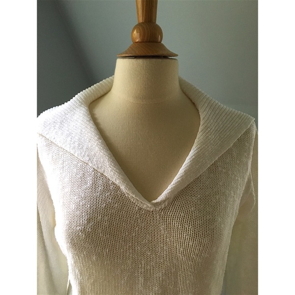 White knitted long sleeve top.