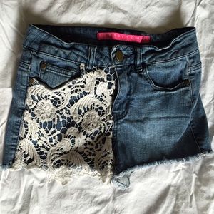 Lace and denim shorts.