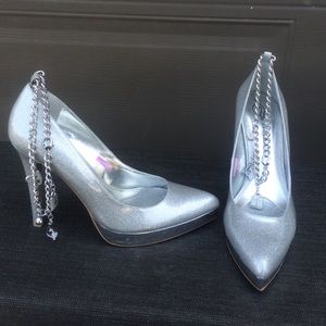 Silver heels with ankle charms