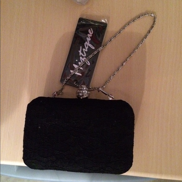 Miztique black lace clutch