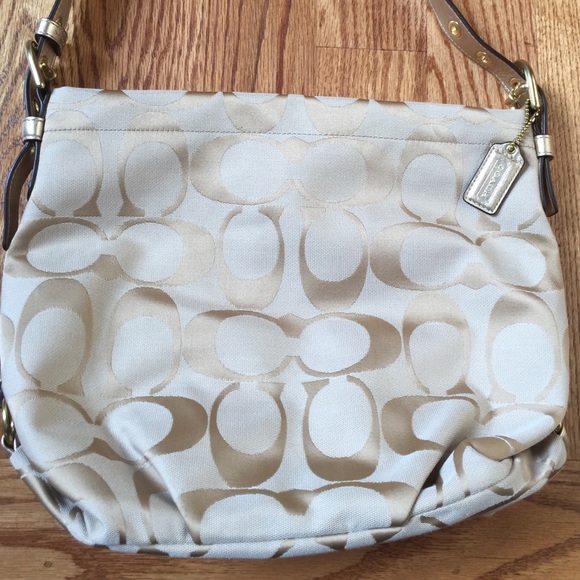 Gold coach purse