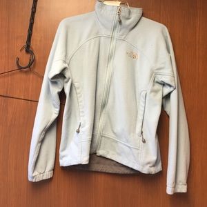 Light blue women's The North Face jacket .