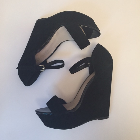 Black ALDO wedges.