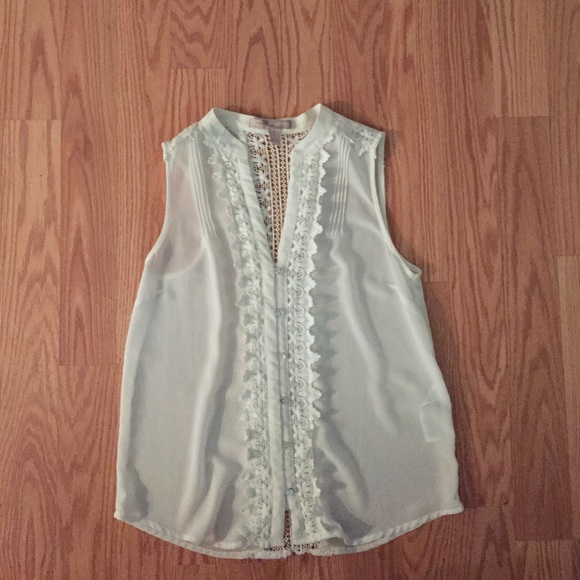 A silk like blouse with lace back