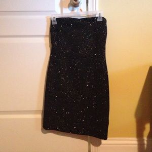 Glittery body con dress