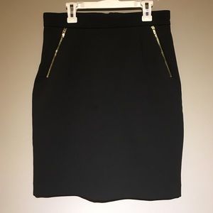 Black skirt with gold zippers