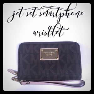 MK Jet Set Smartphone Wristlet