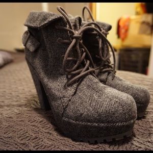 Herringbone grey high heeled boots.