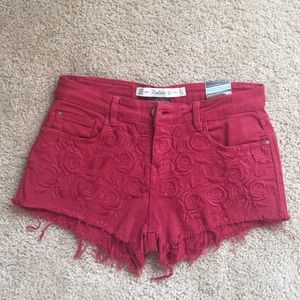 Zara Shorts - Zara Red rose shorts in size 4 NWT Zara Shorts - Zara Red rose shorts in size 4 NWT