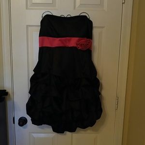 Black dress with pink accent flower