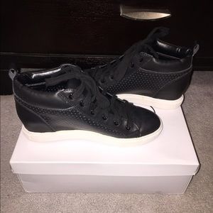 Mini wedge high top sneakers.