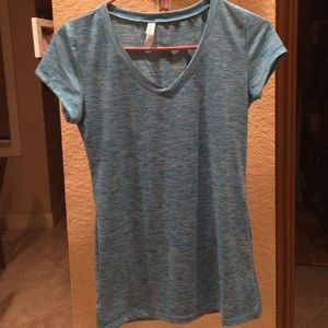 Work out blouse. BRAND NEW. NEVER WORN.