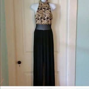 Black jumpsuit with gold lace bodice