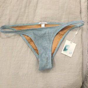 Large light blue made by dawn bikini bottoms.
