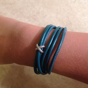 Teal leather bracelet with silver charm